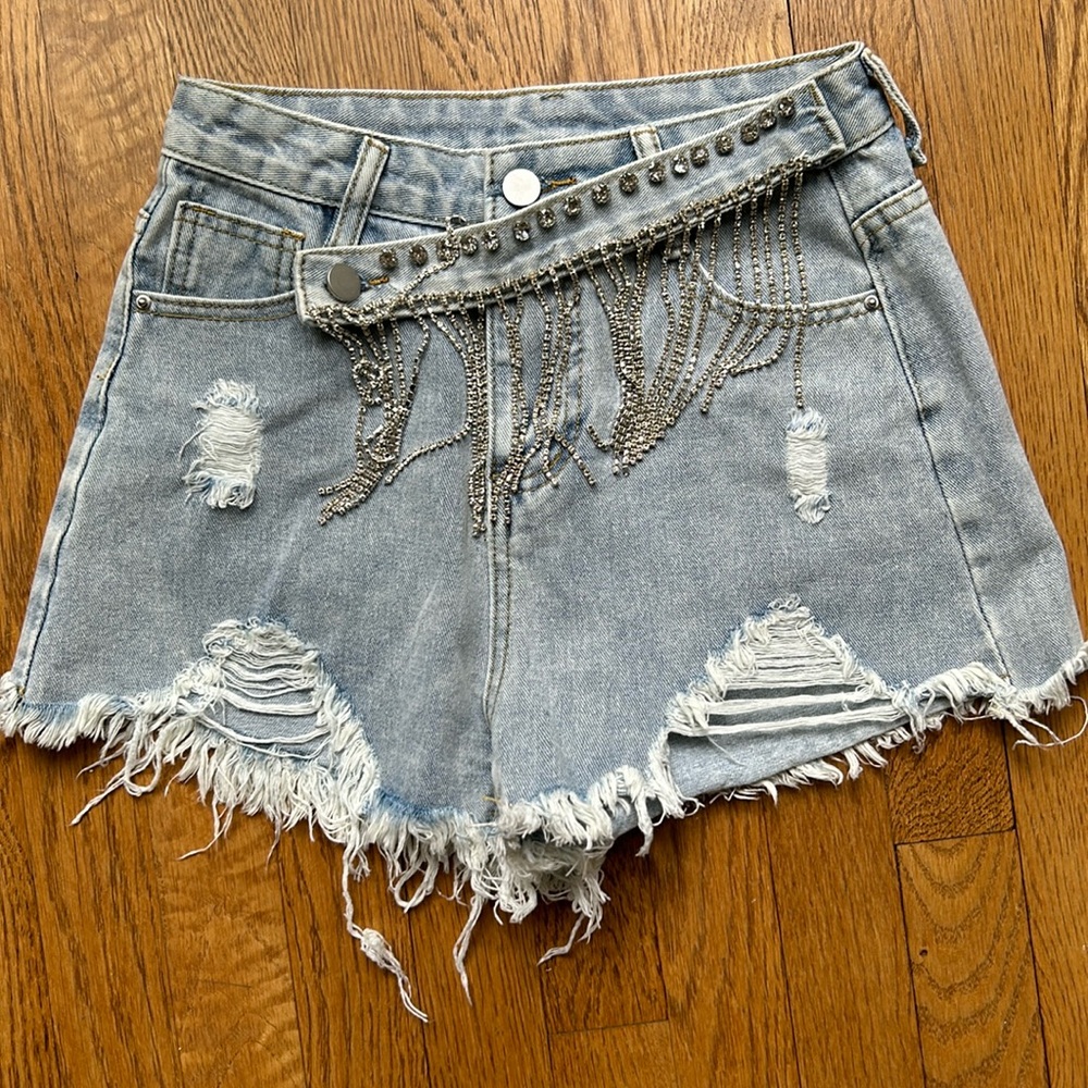 VINTAGE thrifted blue cut off jean shorts with diamond tassels
